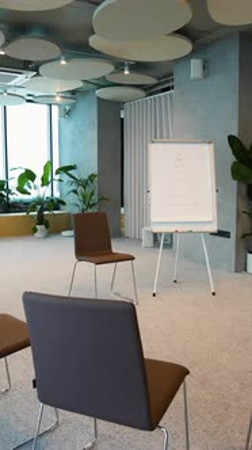 Empty Office Meeting Room with Pyramid on Whiteboard