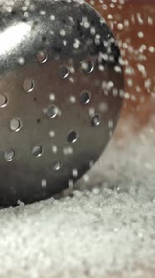 Salt Falls Onto the Salt Shaker Filmed on a Highspeed Camera at 1000 Fps