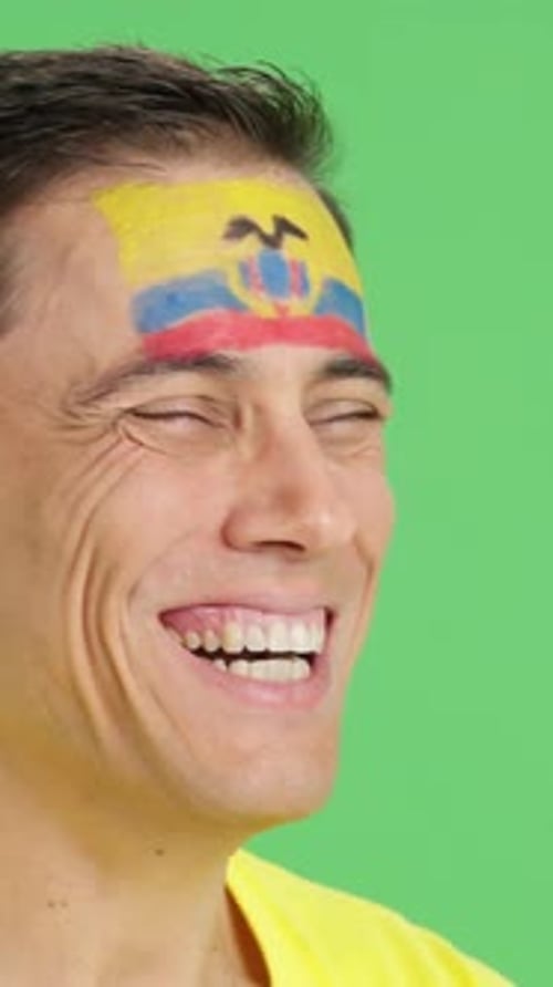 Smiling Young Adult with Flag Painted on Forehead