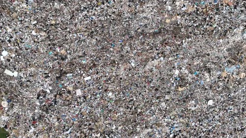 Top down aerial drone view of trash in landfill
