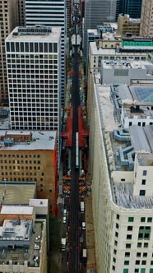 Aerial view of Chicago's urban landscape with transit activity
