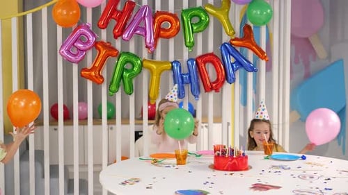 Kids Celebrating at a Cheerful Birthday Party