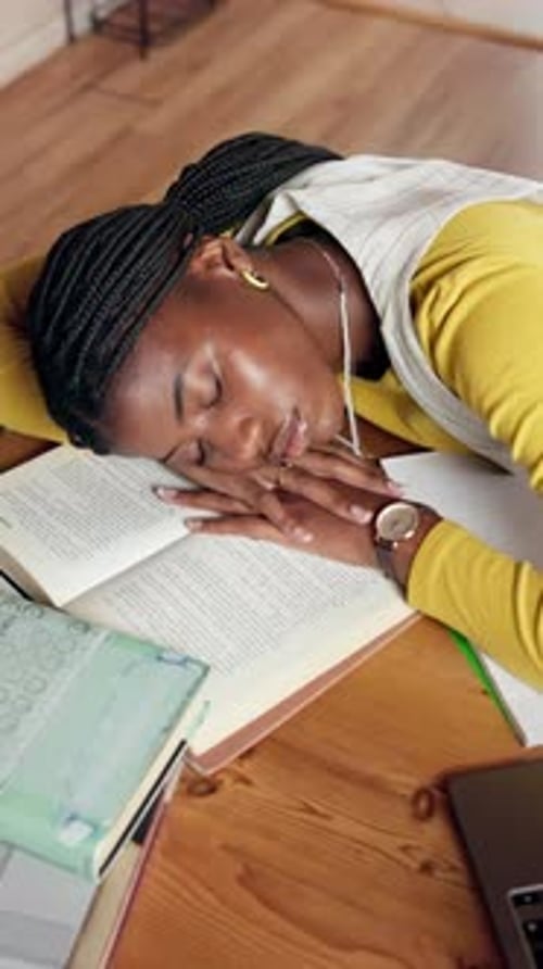 Woman Asleep on Open Book While Studying