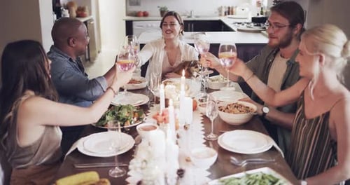 Friends Celebrating Together with Toasts at Home