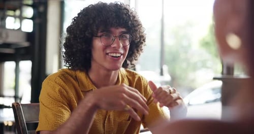 Conversation, date and man in restaurant for love, connection or bonding with girlfriend