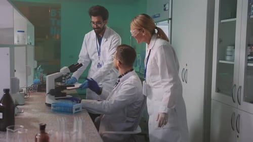 Scientists Collaborate on Research in Modern Laboratory