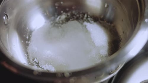 Caramel Boiling Process Mix with a Spoon Macro