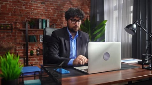 Business Professional Working in Modern Office Setting