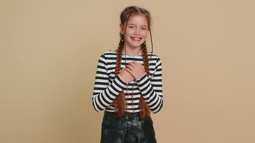 Smiling Young Girl in Striped Shirt