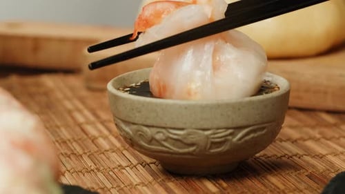 Dipping Dimsun Into Soy Sauce Closeup Macro Dim Sun Gedza Dumplings Spring Rolls on the Table Food