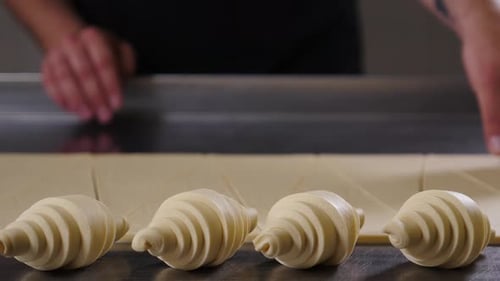 Rolling Dough to Make a Delicious Croissant