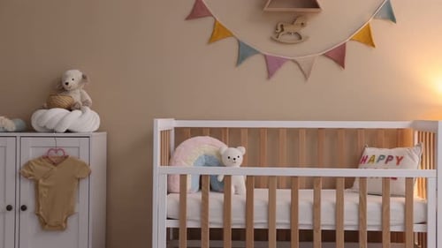 Baby Crib and Furniture in a Cozy Room