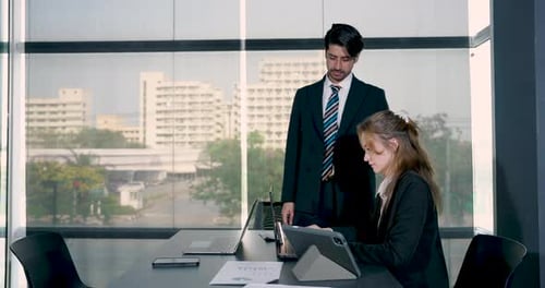 Business Meeting: Man and Woman Discuss Work
