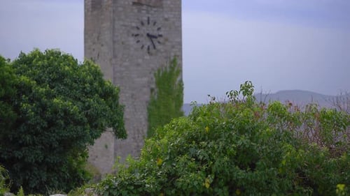 A Handheld Shot of a Clocktower in the Ruins of the Bar Old City or Stari Grad