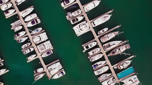 Aerial View of Marina With Docked Yachts on a Clear Summer Day