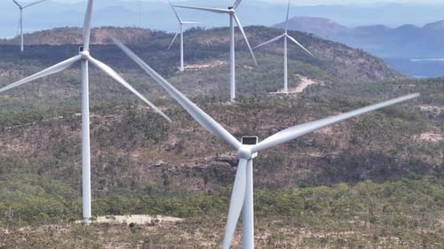 Amazing close up of electric turbines spinning in Mount Emerald Wind Farm, Australia. Technology