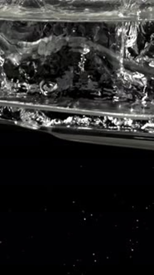 Cutlery Falls Under Water Filmed on a Highspeed Camera at 1000 Fps