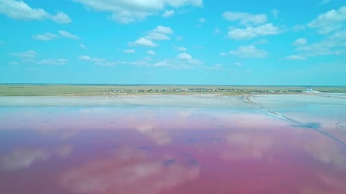Aerial Over the Pink Lake Burlin in Altai Region of Russia Stunning Scenery of Pink Lake and Blue