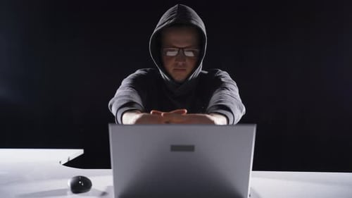 Hacker is preparing for cyber attack.