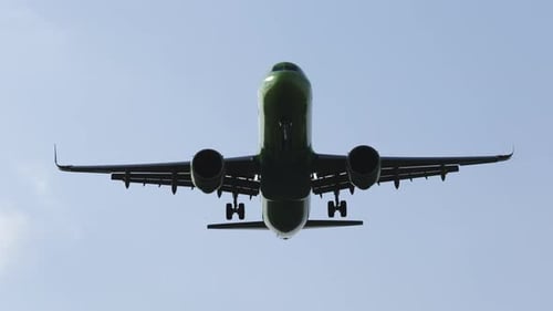 Passenger Airplane Flying in the Daytime Sky
