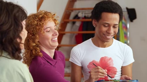 Friends Applying Makeup Together Indoors