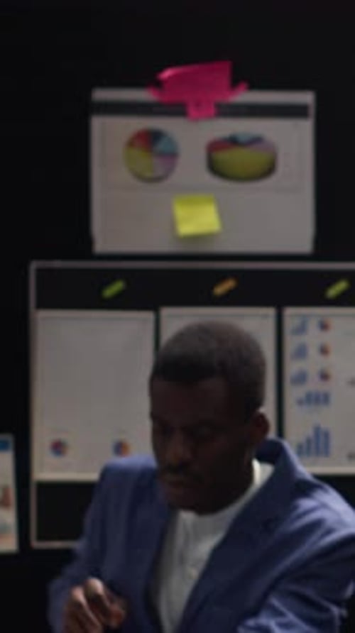 Colleagues Collaborating at Modern Office Desk