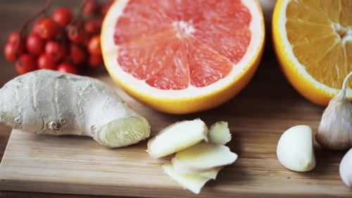 Ethnoscience Food and Cooking Concept - Ginger Root Grapefruit Orange and Garlic