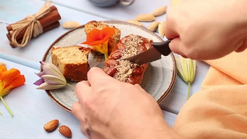 Cutting a Muffin on a Plate Close Up
