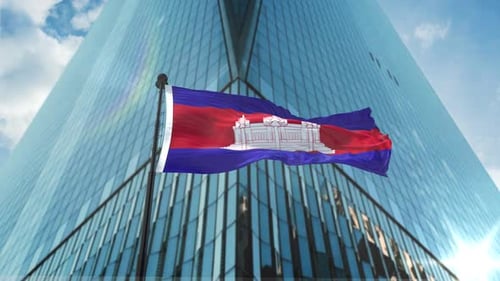 Realistic Cambodia Flag Waving with Modern Skyscraper Background