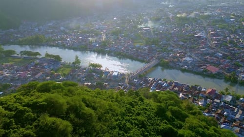 Aerial View of River and Cityscape