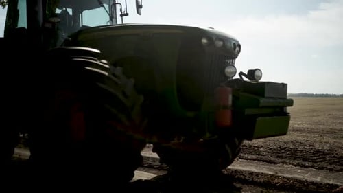 Tractors plowing the field in Ukraine