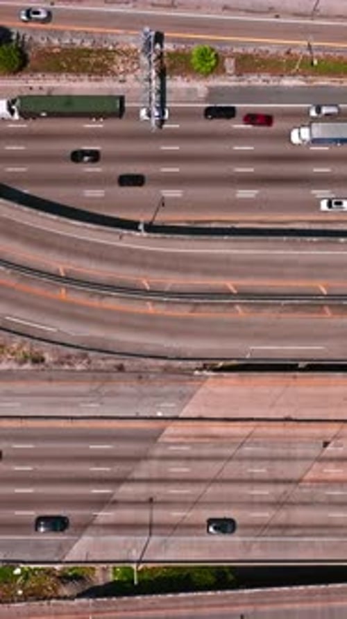 Traffic flow on Miami highways captured from above during daylight
