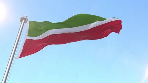 Realistic Green White Red Flag Waving Against Blue Sky Loop