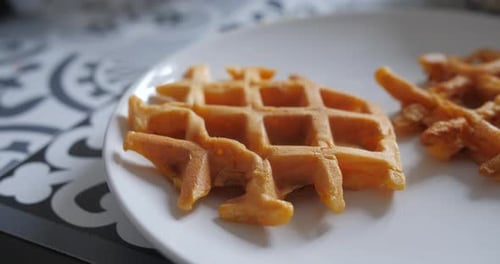 Freshly Cooked Sweet Potato Waffles In Ceramic Plate. Unique Healthy Recipe. close up