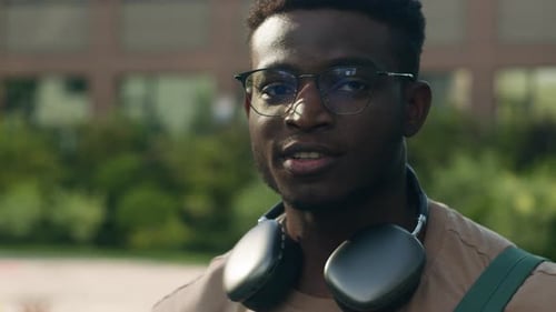 Close Up Portrait Outdoors in Park in City African American University Student Guy Man Male High