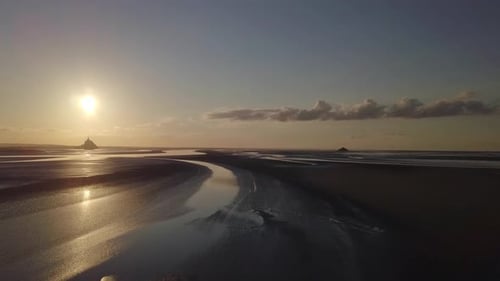 Mont Saint Michel abbey medieval castle in Normandy Bretagne France. Gothic island fortification sun