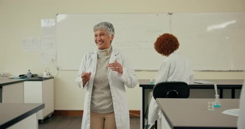 School, biology and teacher with students in classroom for learning, education and chemistry lesson