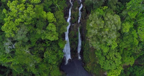Drone Aerial View of Hidden Waterfall in Tropical Jungle Forest