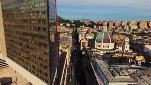 Drone Forward Flight in Genoa with Reflection on Modern Building and Dome