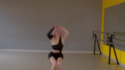 Graceful Energetic Hip Hop Woman Dancer Performing Freestyle Dance in Studio