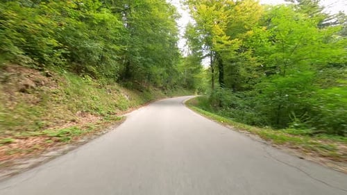 Driving along beautiful mountain road.