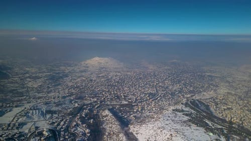 Snowy Aerial View of a Winter City