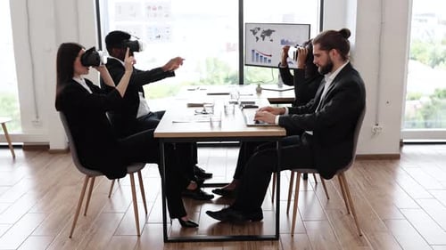 Business Team Using Virtual Reality in Modern Office Meeting