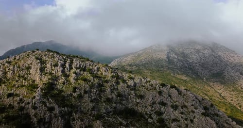 Beautiful Rocky Mountain Landscape in Summer Cloudy Sky