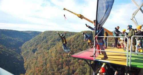 Fayetteville, Tennessee / Usa - November 14 2019: Group Base Jumping, Jump Off Platform With Para...