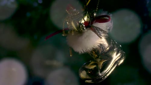 Gold Christmas Stocking Ornament Hanging on Tree