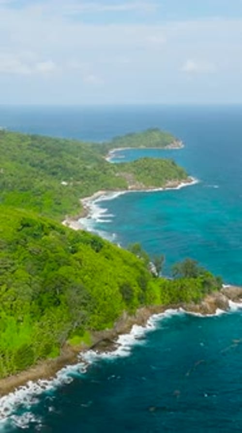 The Coast of Mahe Island with Jungle and Ocean Surf Seychelles Mahe