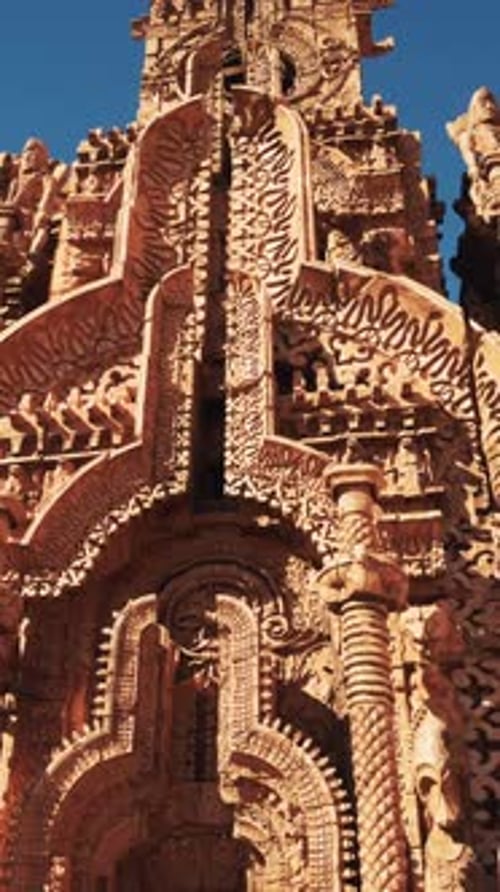 A Beautifully Decorated Temple with Intricate Statues Adorning the Walls