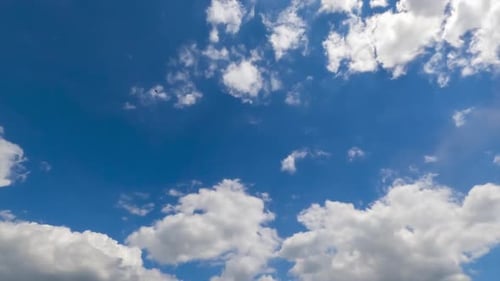 Clouds Moving Slowly Across a Vivid Blue Sky