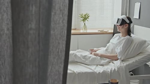 Patient at Clinic Playing in VR Helmet